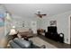 Comfortable living room featuring stylish furnishings, a TV, and plenty of natural light at 3812 Vesta Dr, Raleigh, NC 27603