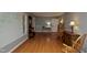 Inviting living room featuring hardwood floors, neutral wall color, and ample space for personalization at 3812 Vesta Dr, Raleigh, NC 27603