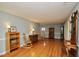 Spacious living room boasts hardwood floors, neutral paint, and ample natural light, ready for your personal touch at 3812 Vesta Dr, Raleigh, NC 27603