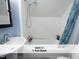 Clean, functional bathroom features a shower-tub combo, offering essential amenities at 407 Coolidge St # A, Chapel Hill, NC 27516