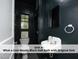 Cool moody half bathroom featuring a unique sink and modern fixtures at 407 Coolidge St # A, Chapel Hill, NC 27516
