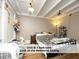 Cozy bedroom with unique ceiling features a large window for natural light at 407 Coolidge St # A, Chapel Hill, NC 27516