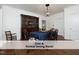 Formal dining room featuring wood floors, a blue tablecloth, and a classic china cabinet at 407 Coolidge St # A, Chapel Hill, NC 27516