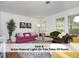 Bright and inviting living area featuring lots of natural light, stylish sofas, and hardwood floors at 407 Coolidge St # A, Chapel Hill, NC 27516