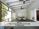 Spacious 12' x 21' screened porch featuring two ceiling fans at 407 Coolidge St # A, Chapel Hill, NC 27516