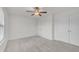 Large bedroom with neutral walls, ceiling fan, and closet, provides ample storage and comfort at 428 Mill Station Ln, Wendell, NC 27591