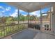 Relaxing screened patio with ceiling fan and outdoor rug at 428 Mill Station Ln, Wendell, NC 27591