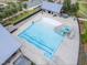 Aerial shot featuring a community pool with water features, lounge chairs, and a splash pad for Gathering-friendly fun at 428 Mill Station Ln, Wendell, NC 27591