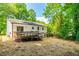 Expansive backyard with a spacious deck perfect for outdoor gatherings and relaxation at 4349 Pickwick Dr, Raleigh, NC 27613