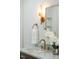 Elegant bathroom features a marble countertop, gold fixtures, and decorative lighting at 4349 Pickwick Dr, Raleigh, NC 27613