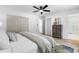 Large bedroom with neutral colors, ensuite bathroom, and hardwood flooring, making it a comfortable retreat at 4349 Pickwick Dr, Raleigh, NC 27613