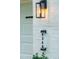 Close up of home address next to carriage lights, adding a touch of modern elegance to the exterior at 4349 Pickwick Dr, Raleigh, NC 27613