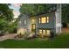 Beautifully renovated home with fresh exterior paint, updated windows, and manicured front yard landscaping at 4349 Pickwick Dr, Raleigh, NC 27613