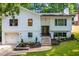 Charming home featuring a well-manicured lawn, a two-car garage, and updated curb appeal at 4349 Pickwick Dr, Raleigh, NC 27613