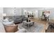 Comfortable living space showcases stylish furniture, a cozy atmosphere, and an open connection to the kitchen at 4349 Pickwick Dr, Raleigh, NC 27613