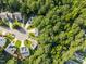 Overhead of homes in a cul-de-sac, bordered by lush, mature trees at 4600 Landover Dale Dr, Raleigh, NC 27616