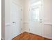 Inviting foyer with a decorative glass door and hardwood flooring at 4622 Ivy Blossom Ln, Raleigh, NC 27604