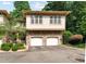 Charming townhouse with stone accents and attached two-car garage at 4831 Crestmore Rd # 202, Raleigh, NC 27612