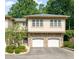 Charming townhouse with stone accents and attached two-car garage at 4831 Crestmore Rd # 202, Raleigh, NC 27612