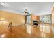 Cozy living room with fireplace, hardwood floors and large windows at 4831 Crestmore Rd # 202, Raleigh, NC 27612