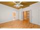 Living room with hardwood floors and access to other rooms in the home at 4831 Crestmore Rd # 202, Raleigh, NC 27612