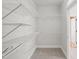 Walk-in closet featuring multiple wire shelving units for optimal storage capacity at 4831 Crestmore Rd # 202, Raleigh, NC 27612