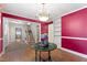 Spacious dining room featuring a chandelier and staircase at 4880 Old Us Hwy 64, Zebulon, NC 27597