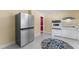 Large kitchen features stainless steel appliances, ample cabinetry, and neutral accents at 4880 Old Us Hwy 64, Zebulon, NC 27597