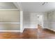 Bright living area with wood-look floors and classic wall paneling at 4880 Old Us Hwy 64, Zebulon, NC 27597