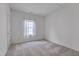 Cozy bedroom featuring a window and neutral carpet at 5000 Mocha Ln, Raleigh, NC 27616