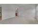 Spacious bedroom with neutral carpet, with a view to the bathroom at 5000 Mocha Ln, Raleigh, NC 27616