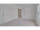 Bedroom with neutral carpet, fresh paint, and two closets at 5000 Mocha Ln, Raleigh, NC 27616