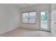 Bright breakfast nook with a door to the backyard at 5000 Mocha Ln, Raleigh, NC 27616