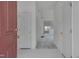 Bright foyer with white floors and a view into the living room at 5000 Mocha Ln, Raleigh, NC 27616