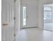 Bright foyer with white floors and doors at 5000 Mocha Ln, Raleigh, NC 27616