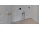 Laundry room with tile floor and washer dryer hook ups at 5000 Mocha Ln, Raleigh, NC 27616
