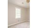 Bedroom with neutral walls, plush carpeting and a window providing natural light at 505 Commander Dr, Wendell, NC 27591