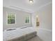 Bedroom features a queen-sized bed, neutral walls, and carpeted floors at 544 Tanner Lake Ln, Raleigh, NC 27610