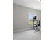 This bedroom offers a window with backyard views and neutral carpeting at 544 Tanner Lake Ln, Raleigh, NC 27610