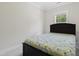 Bedroom features a queen-sized bed, neutral walls, a window, and carpeted floors at 544 Tanner Lake Ln, Raleigh, NC 27610