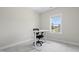 This bedroom offers ample natural light and backyard views at 544 Tanner Lake Ln, Raleigh, NC 27610
