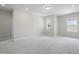 Large bonus room with recessed lighting, neutral walls, and carpeted floors at 544 Tanner Lake Ln, Raleigh, NC 27610