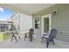 Covered patio featuring outdoor seating, ideal for relaxing and enjoying the fresh air at 544 Tanner Lake Ln, Raleigh, NC 27610