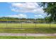 Baseball field with green grass and a yellow fence, promoting sports and community engagement at 553 Sturgeon St, Smithfield, NC 27577