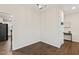 Bright room with hardwood floors, a modern chandelier, and open doorway at 553 Sturgeon St, Smithfield, NC 27577