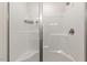 Contemporary shower with white walls, a sleek shower head, and a built-in shelving unit at 553 Sturgeon St, Smithfield, NC 27577