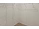 Walk-in closet with wire shelving and carpeted flooring, providing organized storage space at 553 Sturgeon St, Smithfield, NC 27577