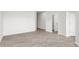 Light-filled living room with open layout and neutral color palette at 5560 Henley Ridge Dr # 187, Graham, NC 27253