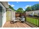 Cozy back deck with seating, perfect for relaxing or entertaining outdoors at 6016 Farm Gate Rd, Raleigh, NC 27606