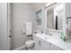 Updated bathroom with modern vanity, mirror, and fixtures at 6016 Farm Gate Rd, Raleigh, NC 27606